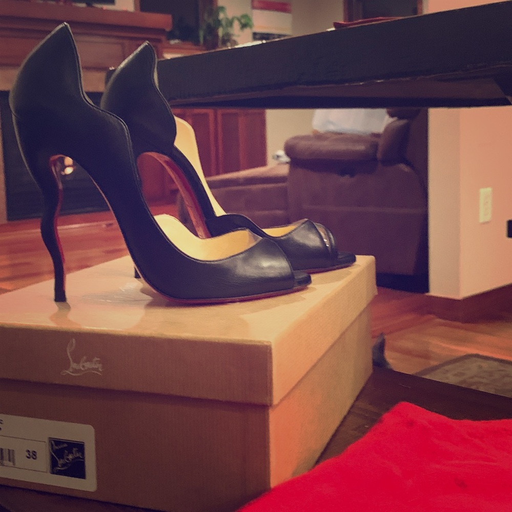 Authentic Christian Louboutin Squiggle heel